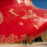 Steven Chilton Architects CLADS Guangzhou theatre in IMPRINTED tattoos